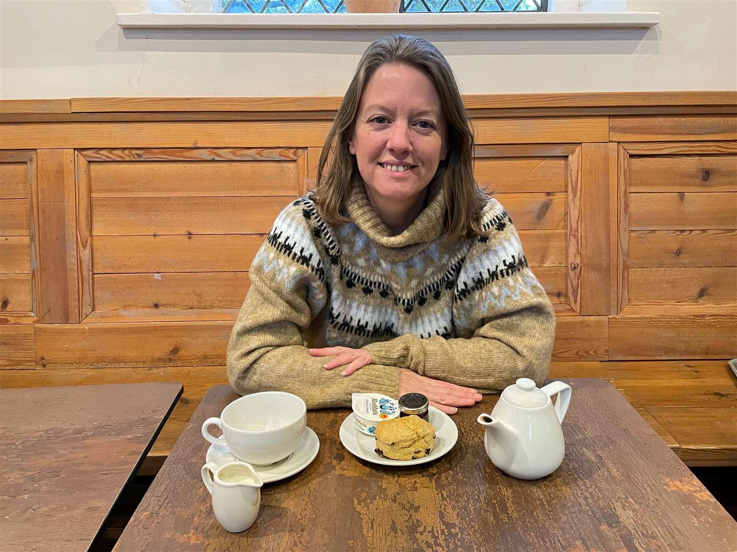 Sarah Merker completed a decade-long project to sample a scone at every possible National Trust location earlier this year (Sarah Merker/PA)