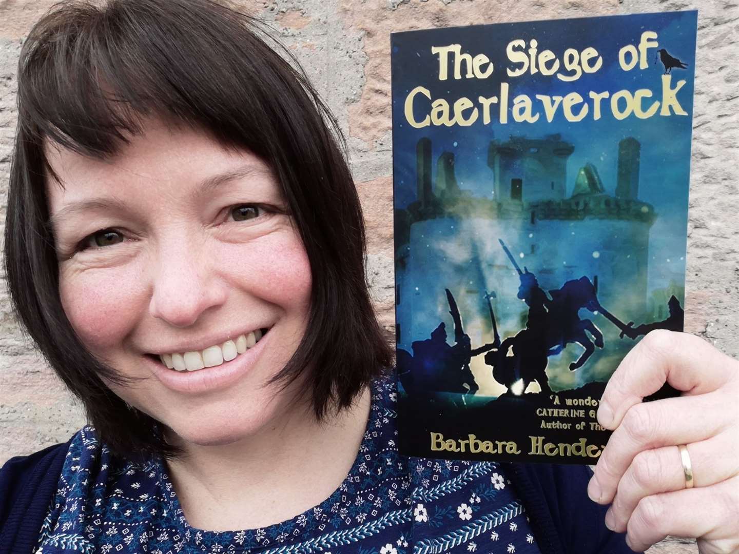 Barbara Henderson with her new book The Siege of Caerlaverock.