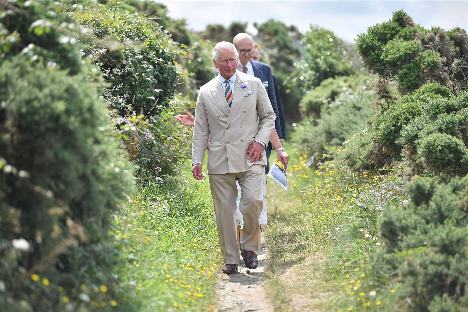 The Prince of Wales walking near Boscastle National Trust Visitor Centre in 2019 (Ben Birchall/PA)