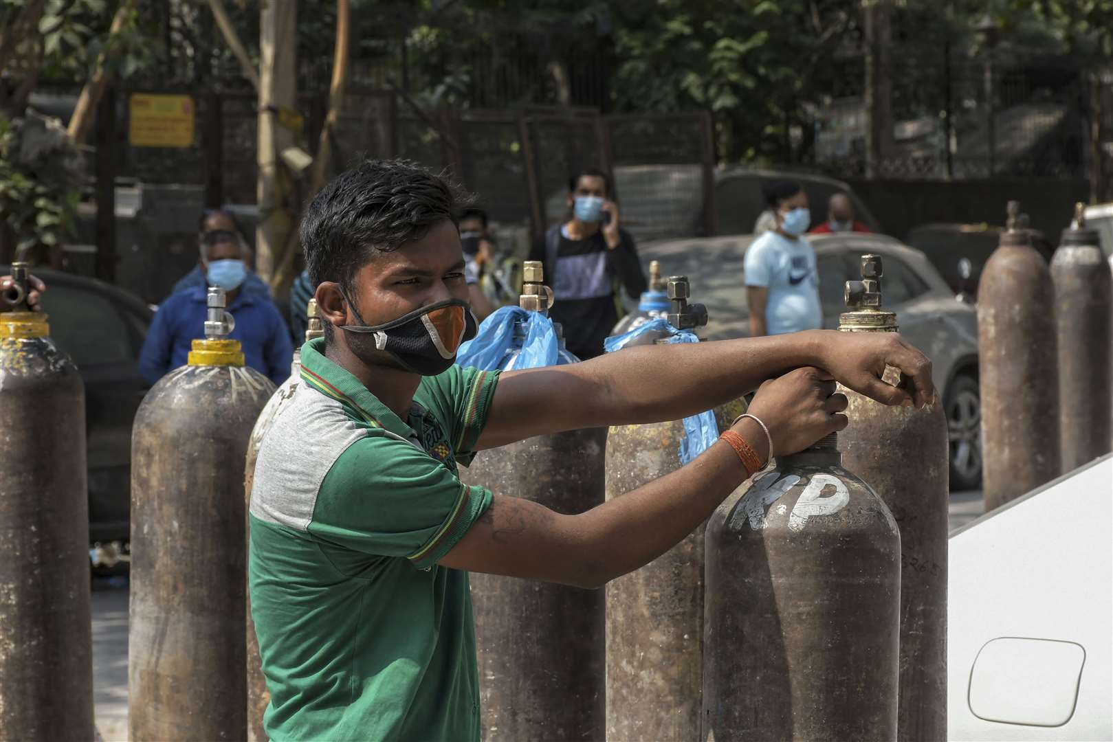 People have been queuing in New Delhi to refill oxygen canisters (Ishant Chauhan/AP)