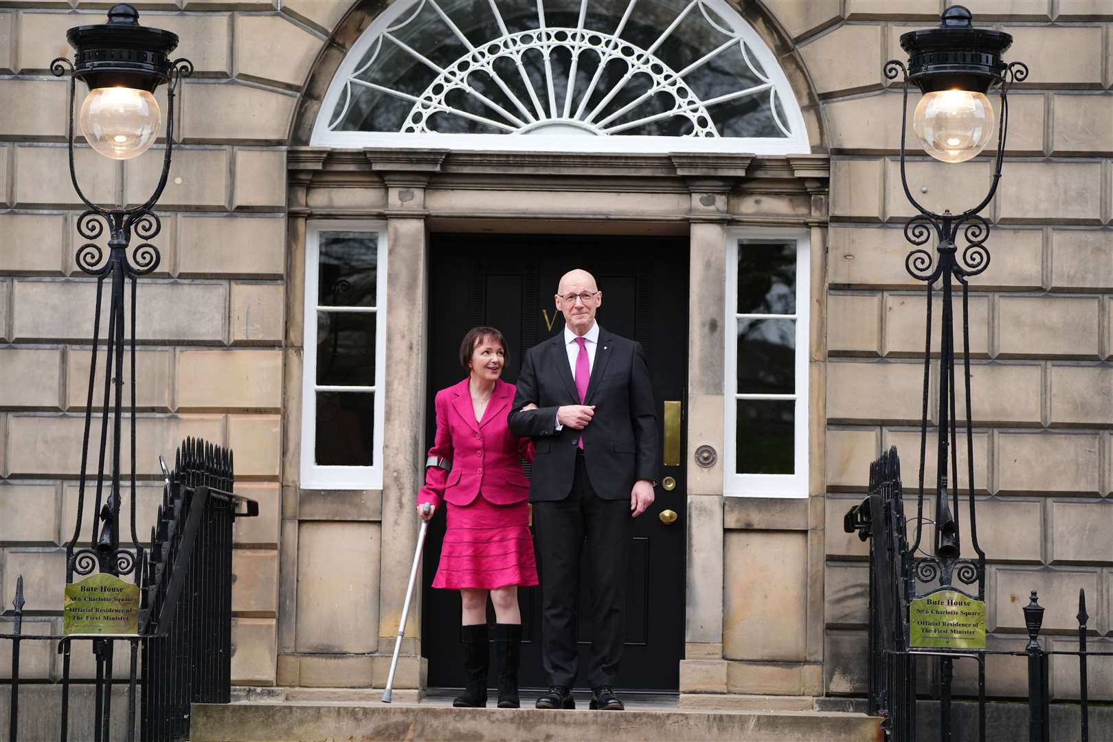 John Swinney with his wife Elizabeth Quigley on the steps of Bute House in Edinburgh (Andrew Milligan/PA)