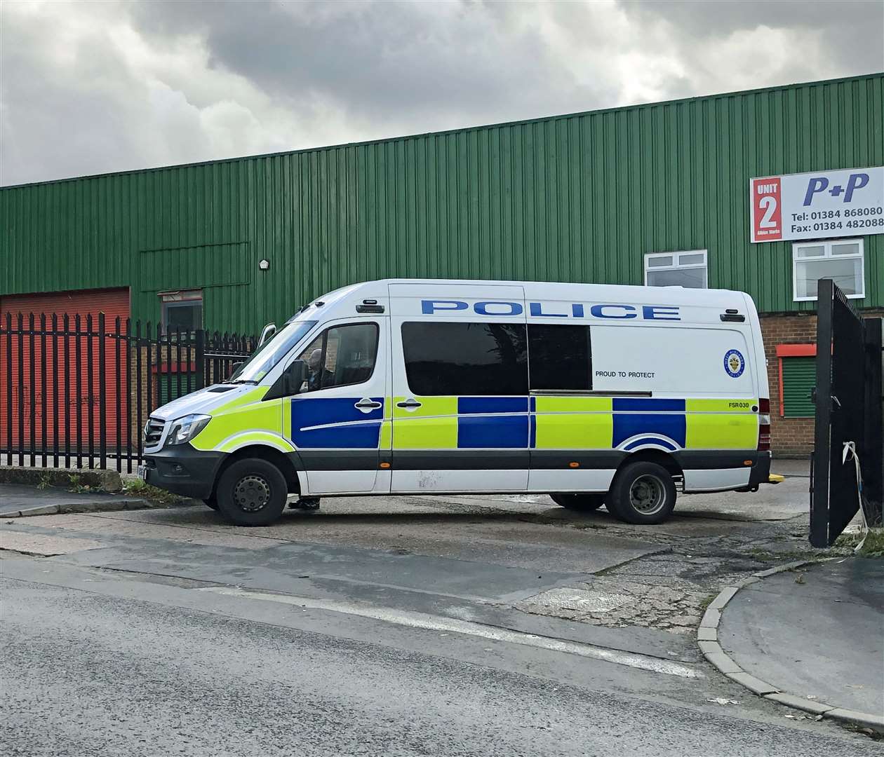 A police vehicle blocking an entrance to Albion Works industrial estate in Brierley Hill (Matthew Cooper/PA)