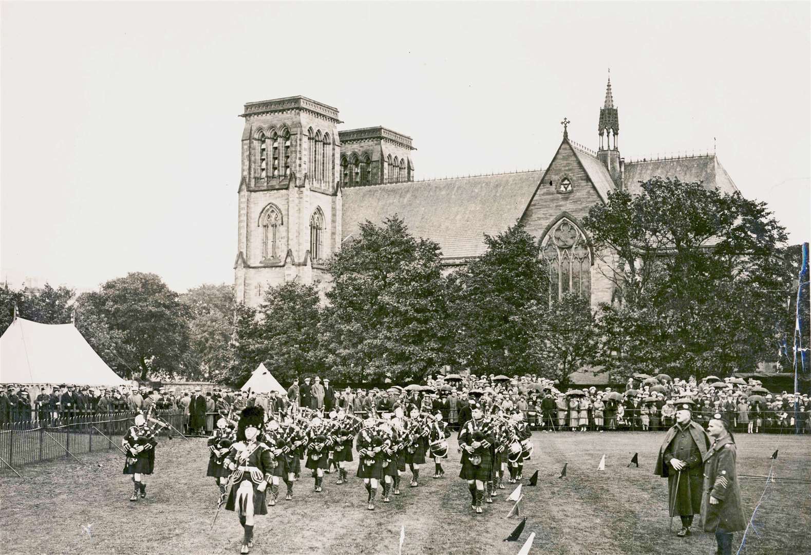 The pipes and drums of the Queen Victoria School Band performing at the 1927 Northern Meeting Games at the Northern Meeting Park in Inverness.