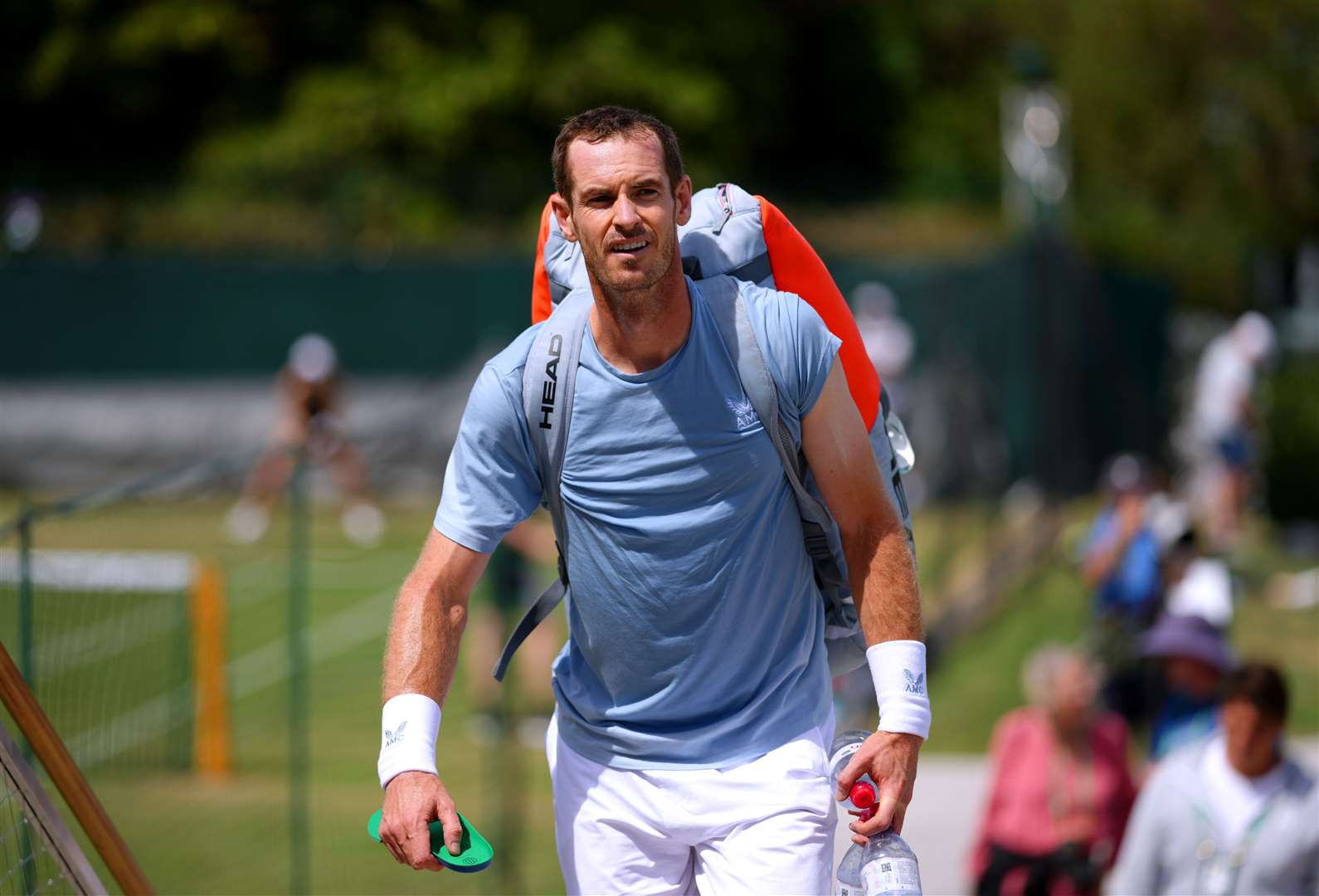 Sir Andy Murray returns from a practice session ahead of Wimbledon (PA)