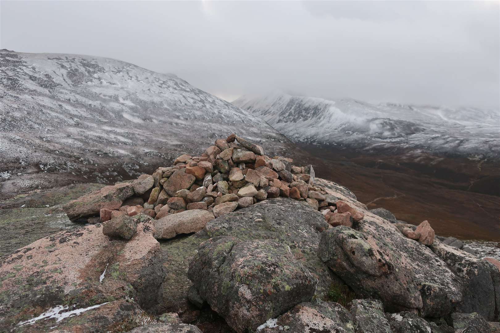 Creag a' Chalamain looking over the Lairig Ghru to the shrouded Braeriach.