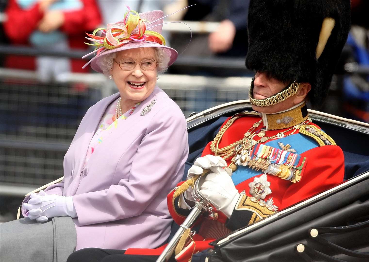 The Queen and Philip return to Buckingham Palace following Trooping the Colour in 2010 (Dominic Lipinski/PA)