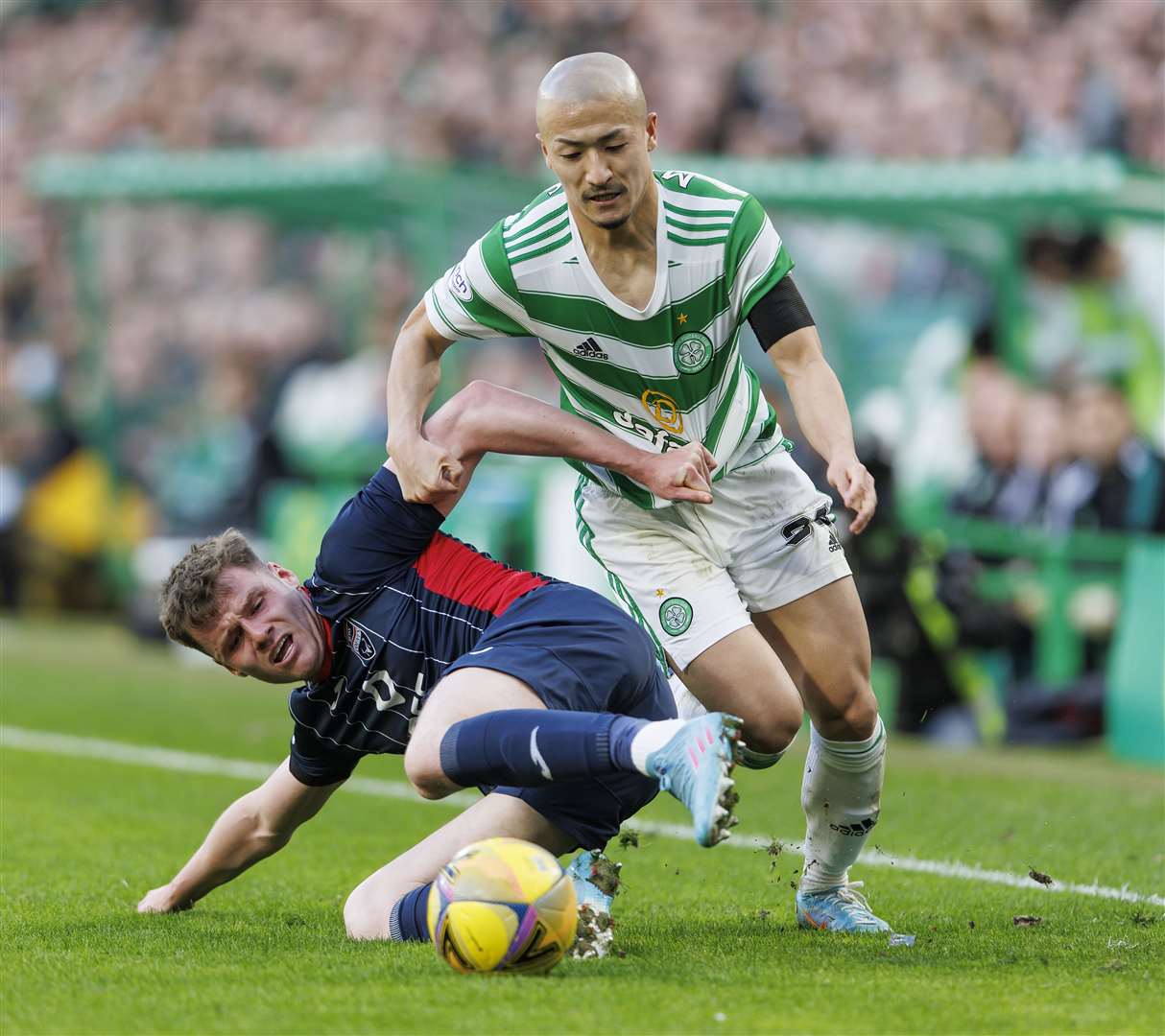 Jack Burroughs tussles withg Celtic's Daizen Maeda. Picture by Kenny Ramsay.