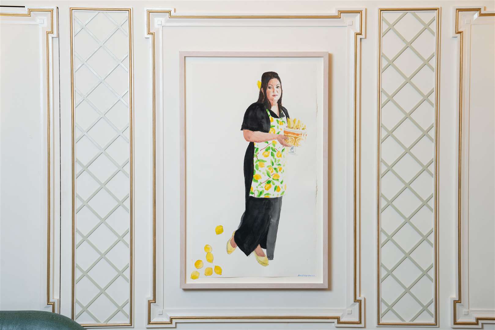 The watercolour shows Ms Melvin wearing an apron decorated with lemons (Jack Barnes for Fortnum & Mason/PA)