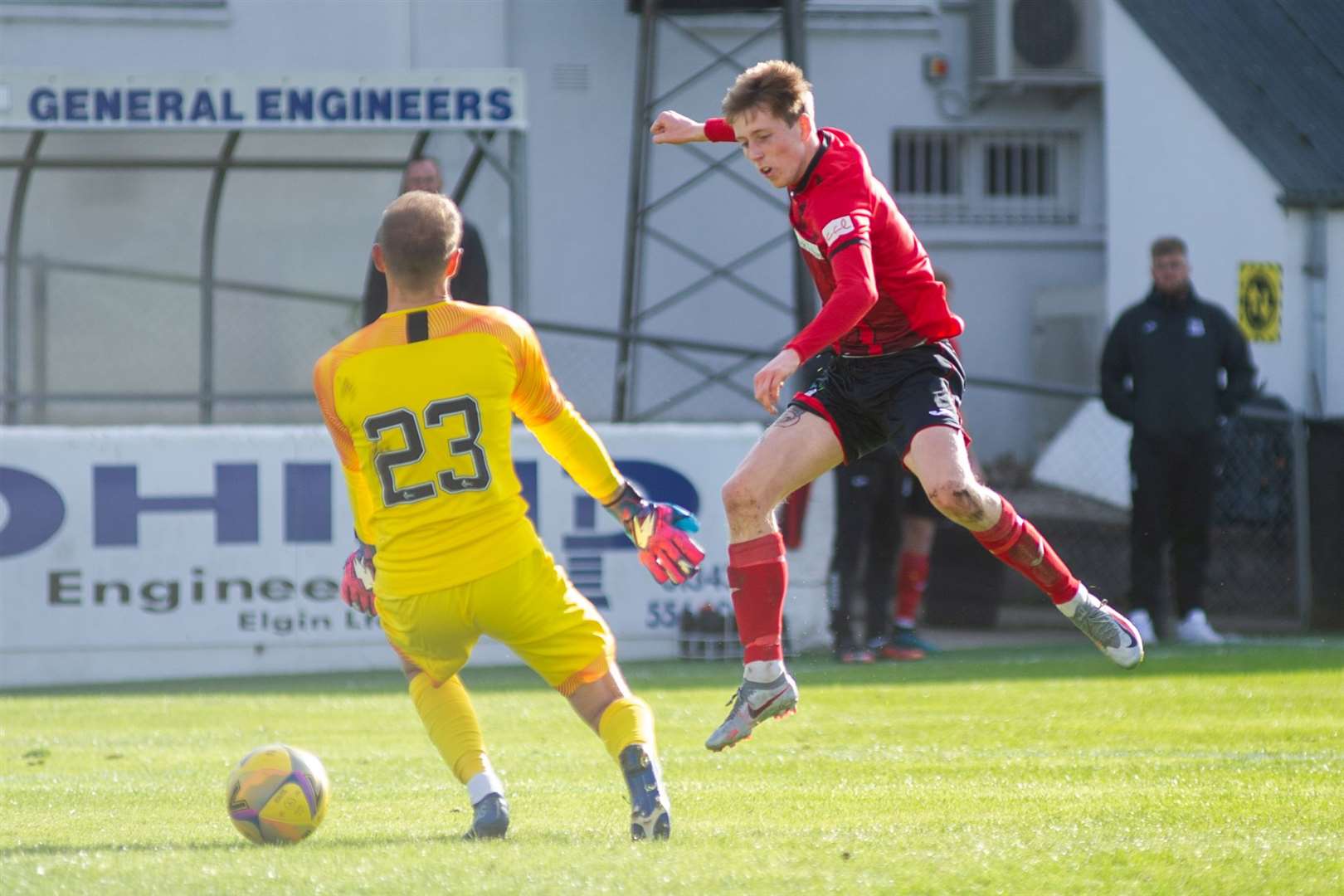 Kane Hester nets his second goal for Elgin past keeper Cammy Mackay. Picture: Daniel Forsyth..