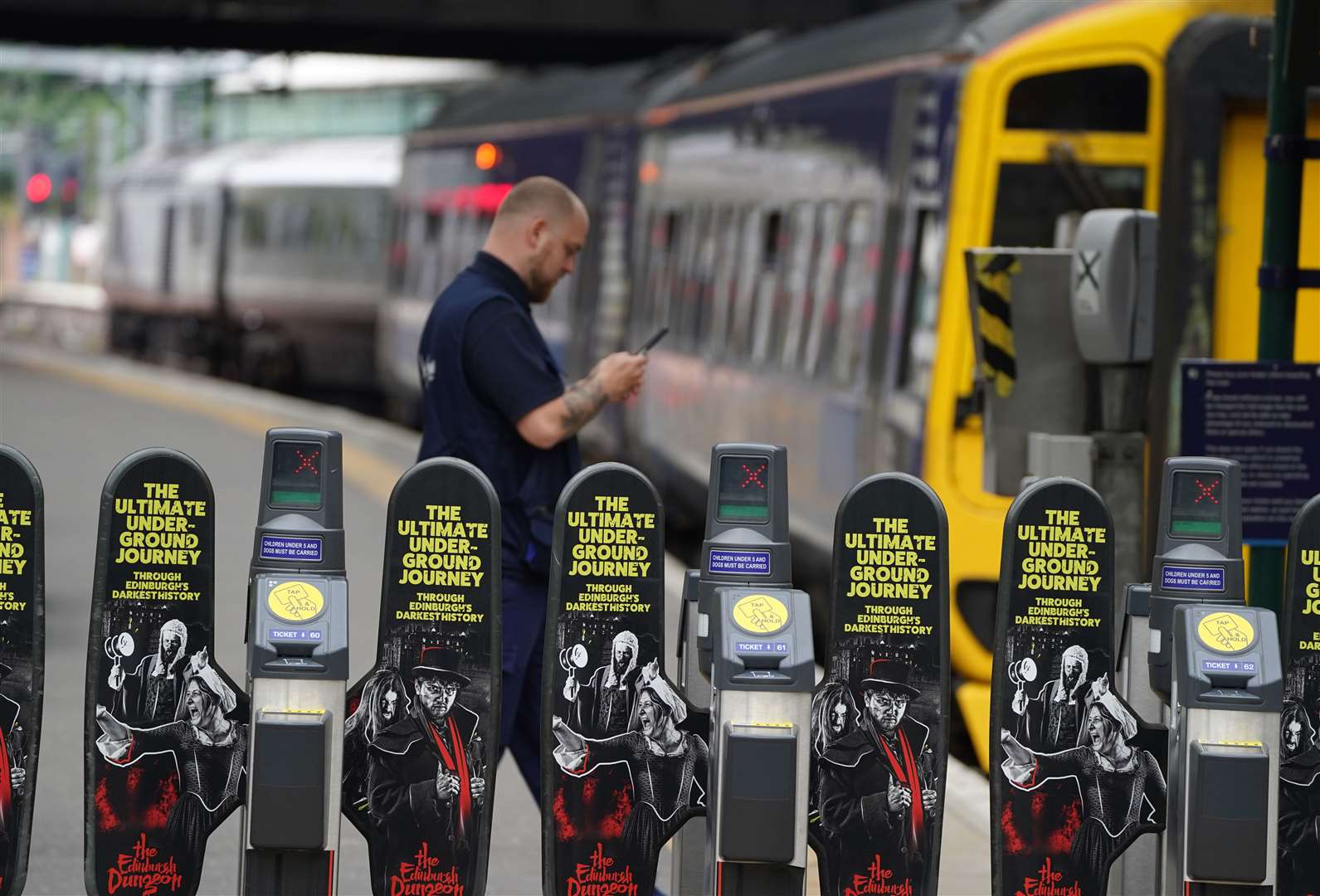 Ticket barriers at Waverley station in Edinburgh (Andrew Milligan/PA)