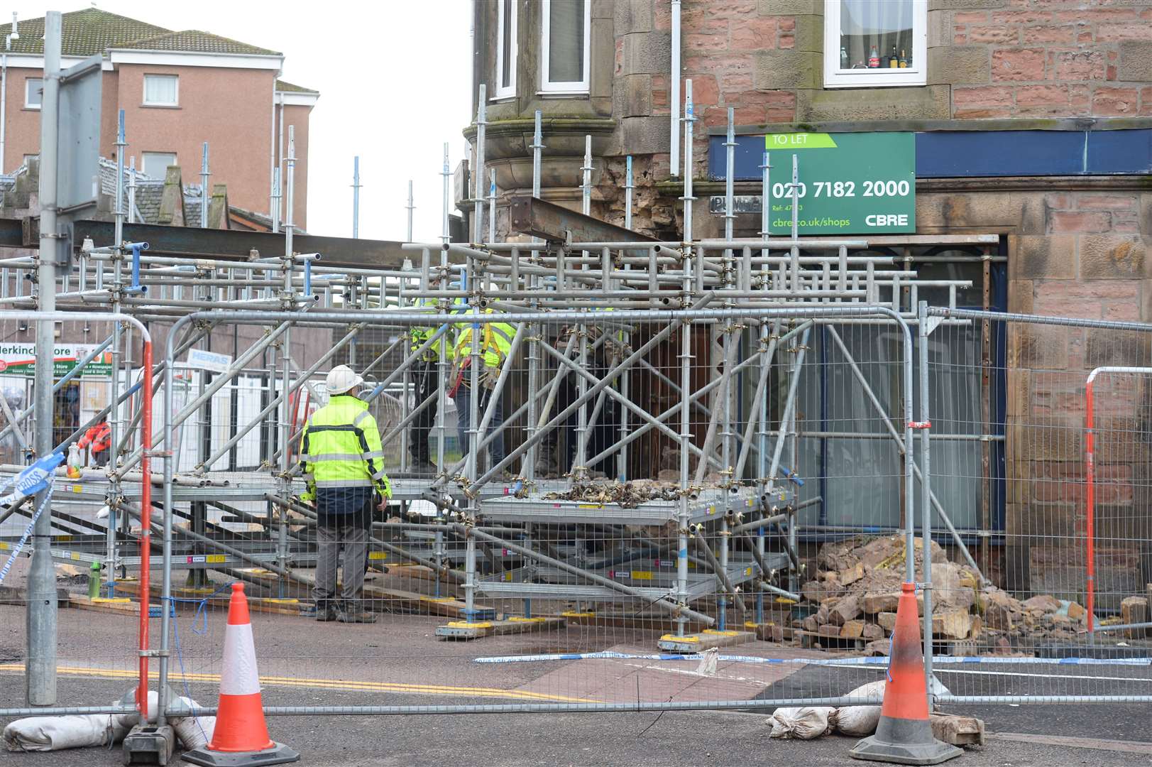 Workmen on site at Grant Street building last Thursday morning. Picture: Gary Anthony