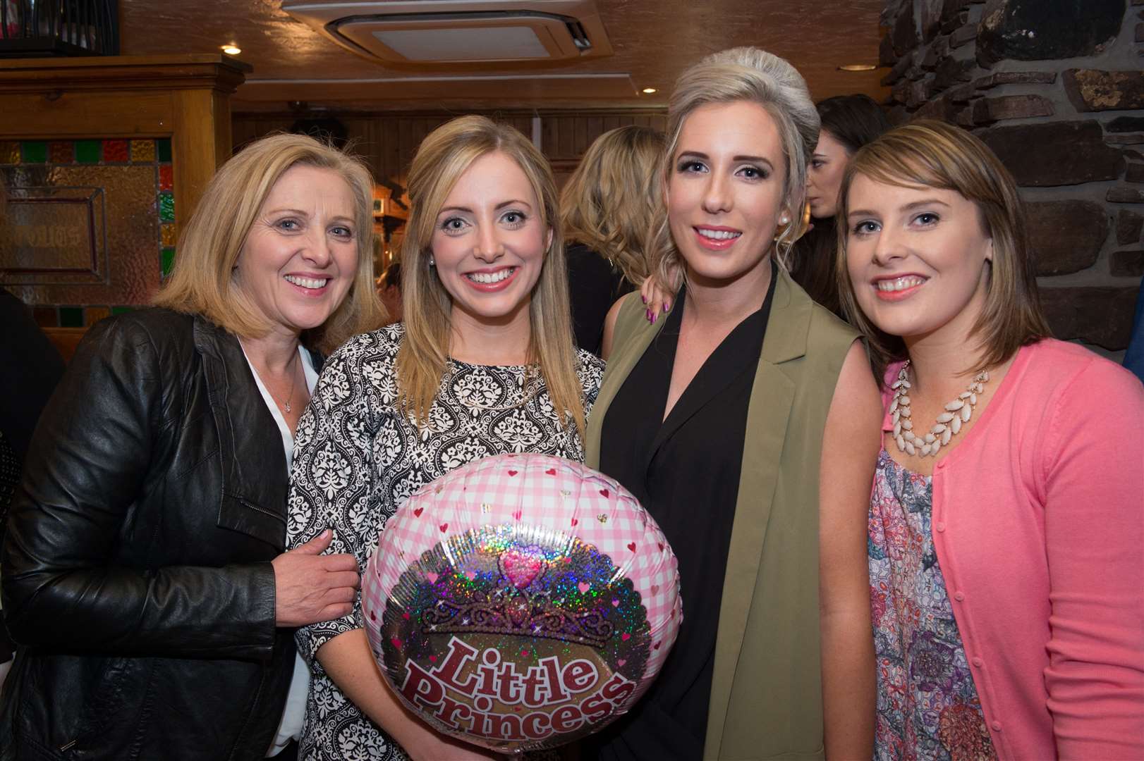 CitySeen 18APR2015..Ashleigh Rutherford (ballon) celebrates her birthday in Johnny Foxes with (left to right) mum Norma Rutherford, Emma MacNeil and Rebecca Duff...Picture: Callum Mackay. Image No. 028386.