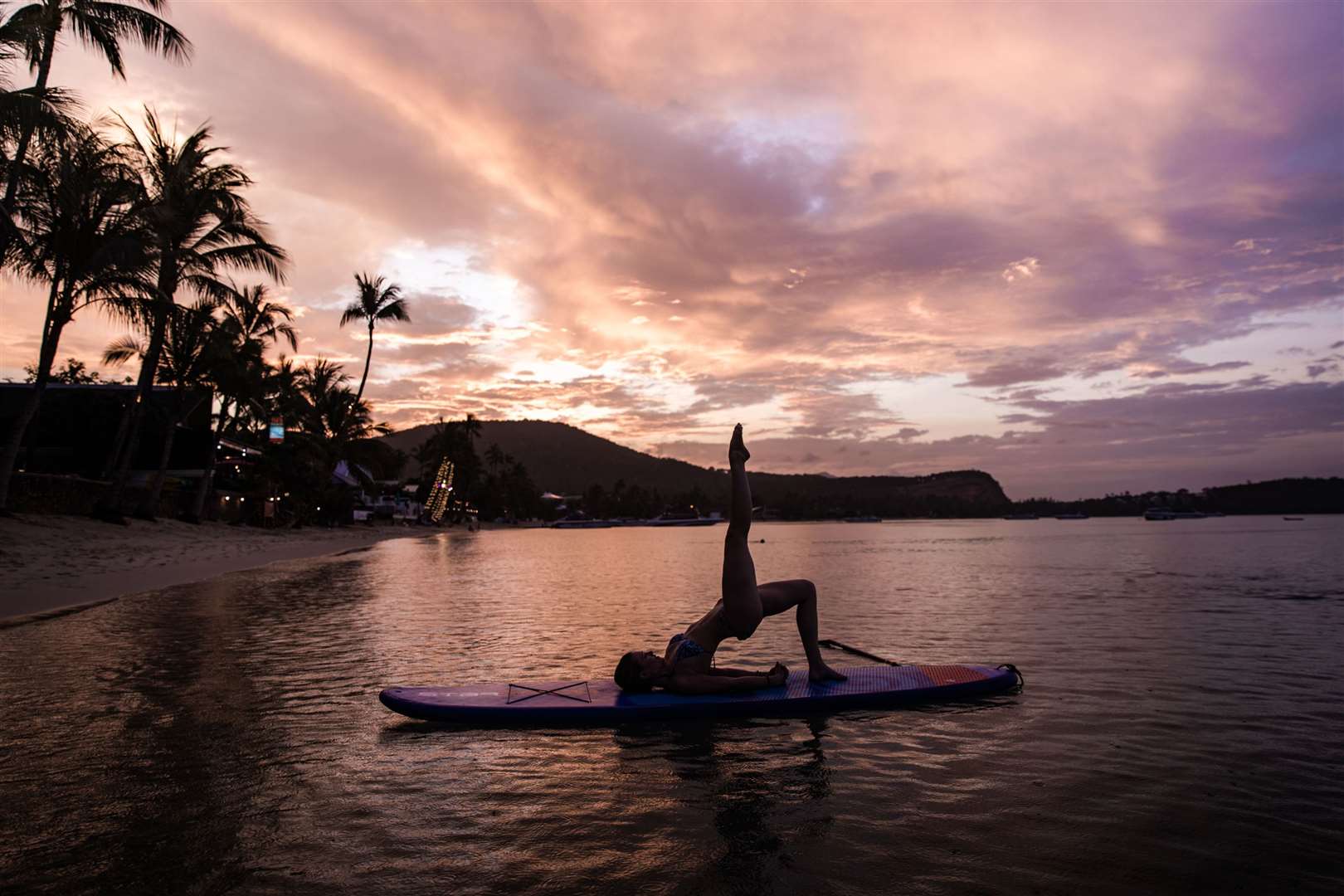 Sunset yoga in Koh Samui. Picture: PA Photo/Ben Glassco