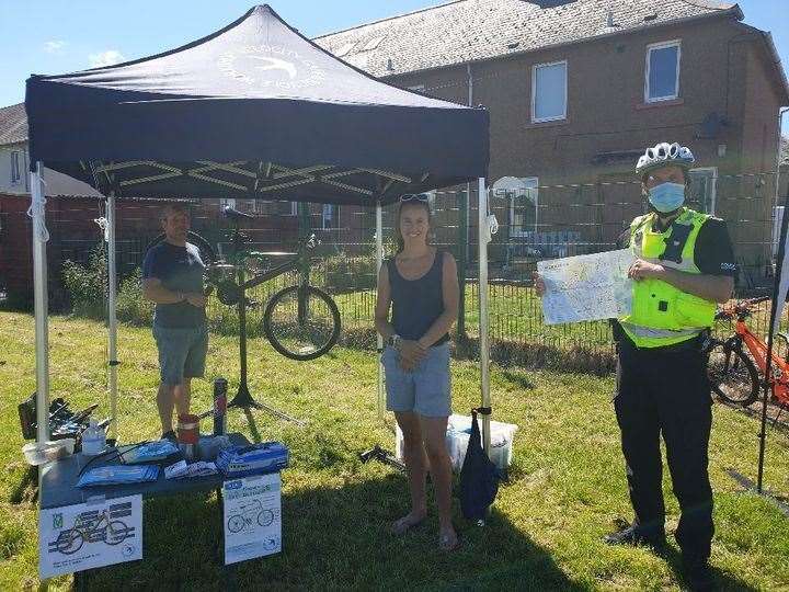 Police help with bike workshops.