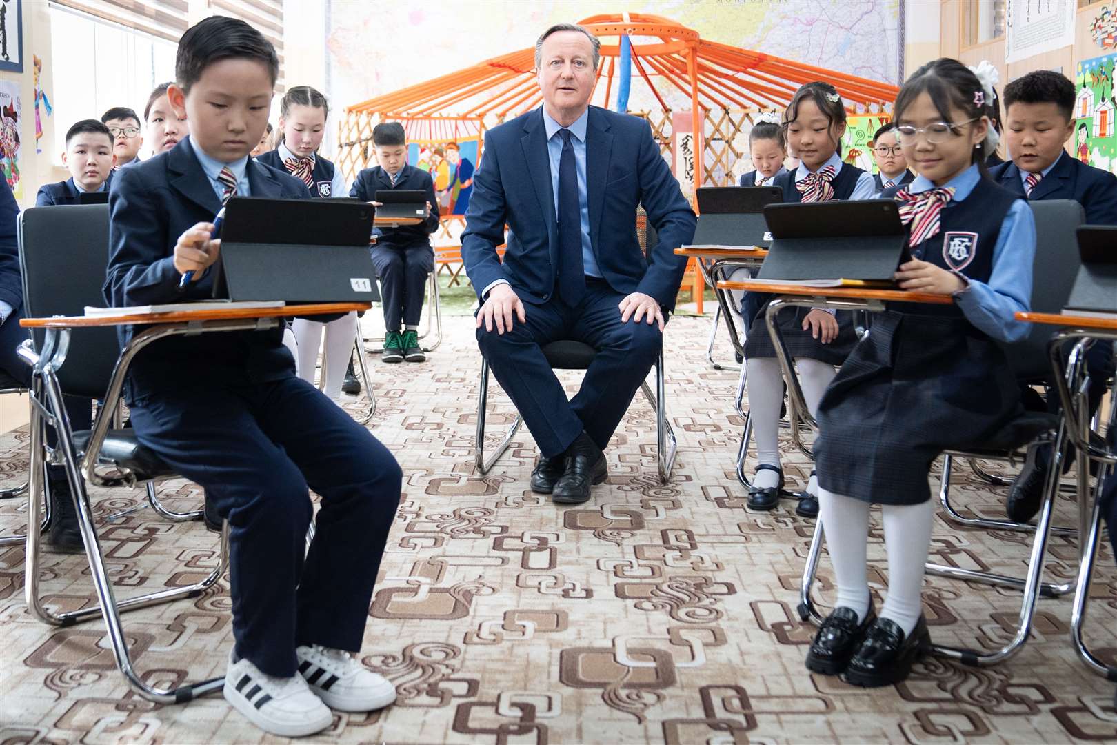 Lord Cameron meets pupils at School No 23 in Ulaanbaatar (Stefan Rousseau/PA)