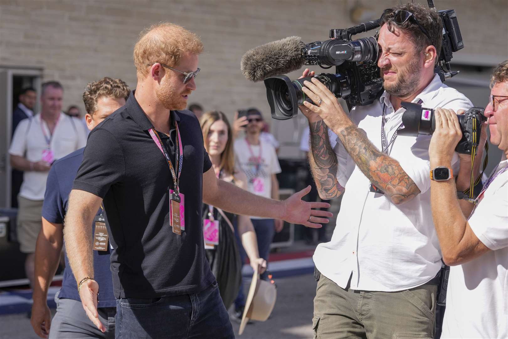 The Duke of Sussex conducts an interview during the Formula One US Grand Prix (Nick Didlick/AP)