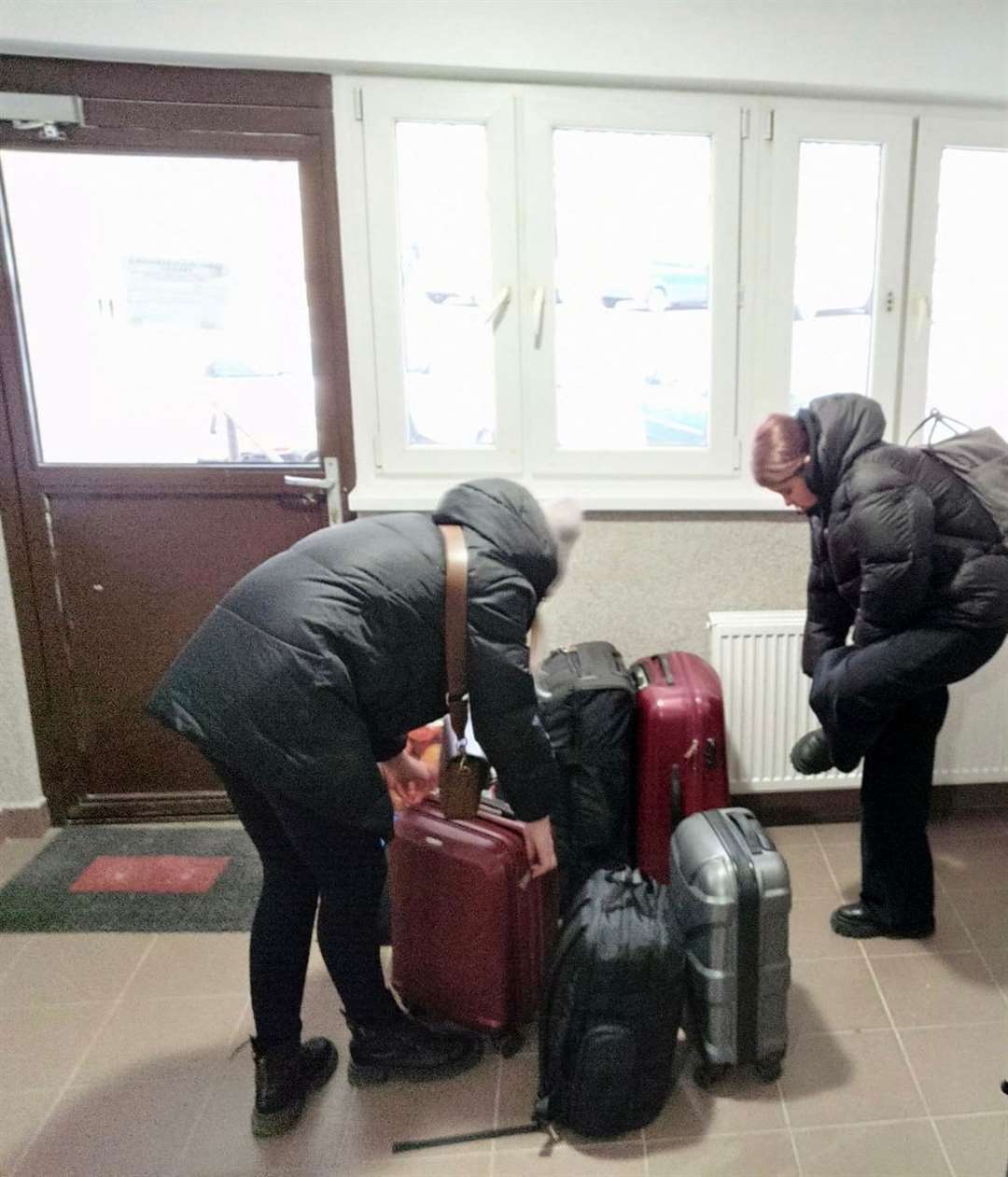 Hanna Hordynska in Ukraine with her sister as they prepared to flee the country (Hanna Hordynska/PA)