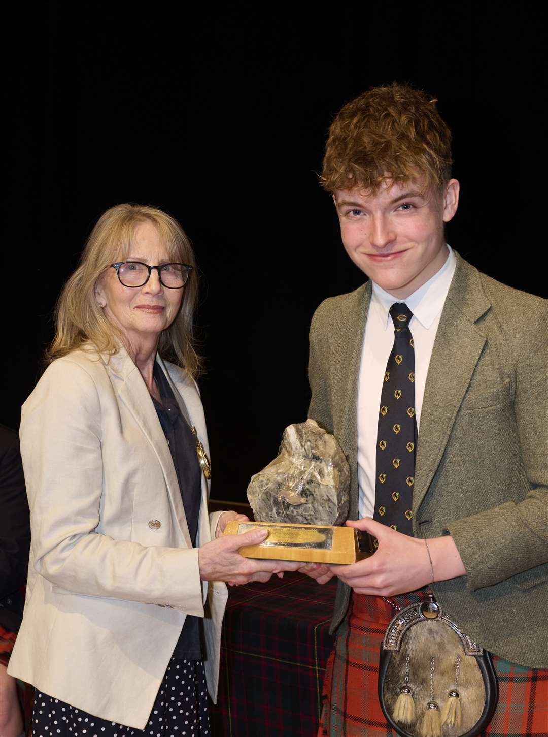 Glynis Campbell-Sinclair (the Provost of Inverness) with Lewis Maxwell who won1st U18 Piobaireachd at the Northern Meeting 2022 which was held at Eden Court in Inverness.