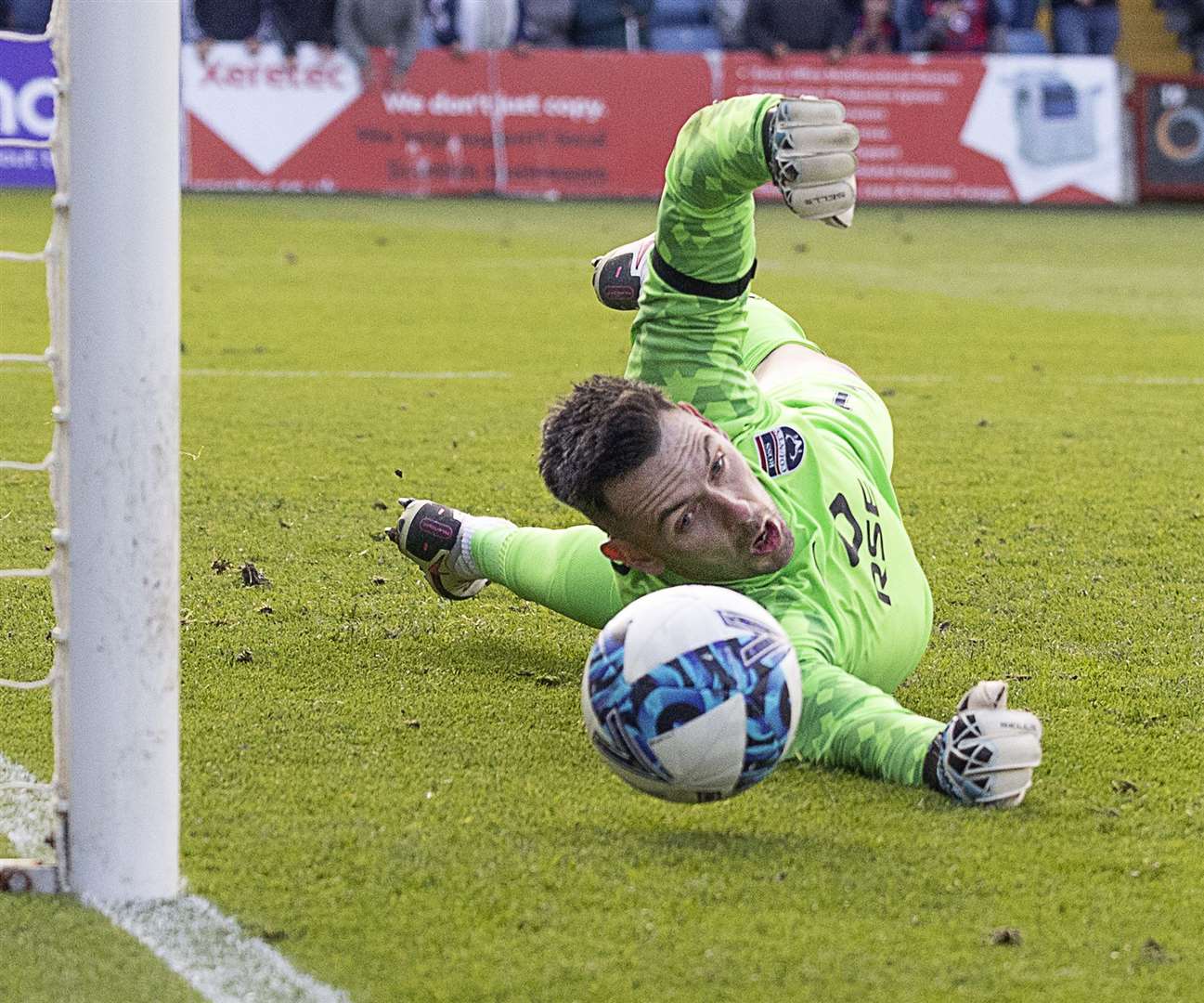 Ross County 'keeper Ross Laidlaw saves his 2nd penalty-kick from Partick's Ross Docherty. Picture: Ken Macpherson.