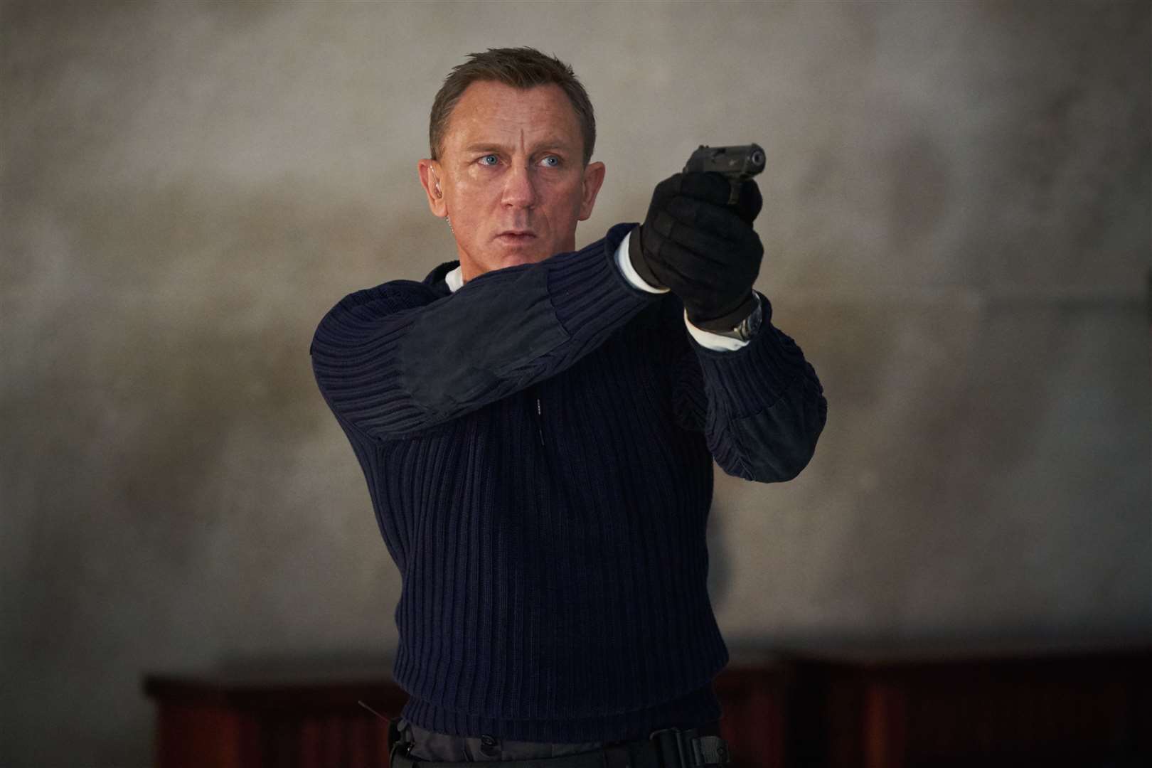 Daniel Craig playing James Bond in the delayed Bond film No Time To Die (Nicola Dove/PA)