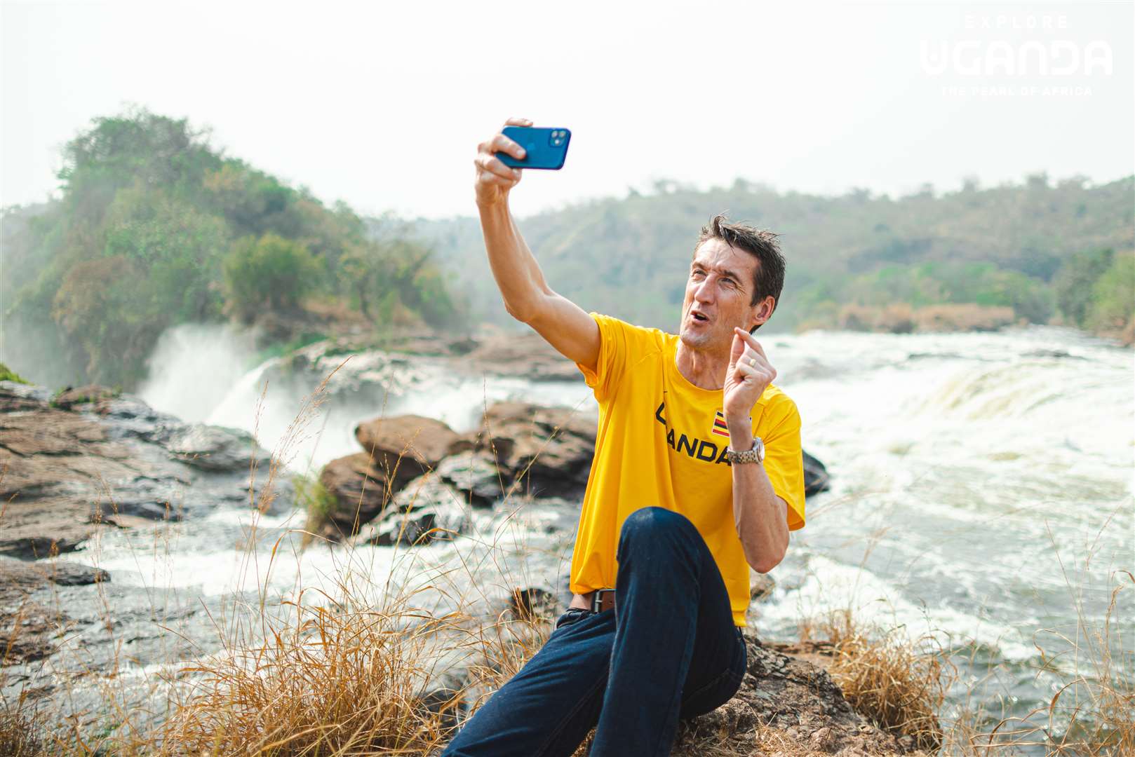 Sports commentator Rob Walker taking a selfie in front of Murchison Falls in Uganda (Uganda Tourism Board)