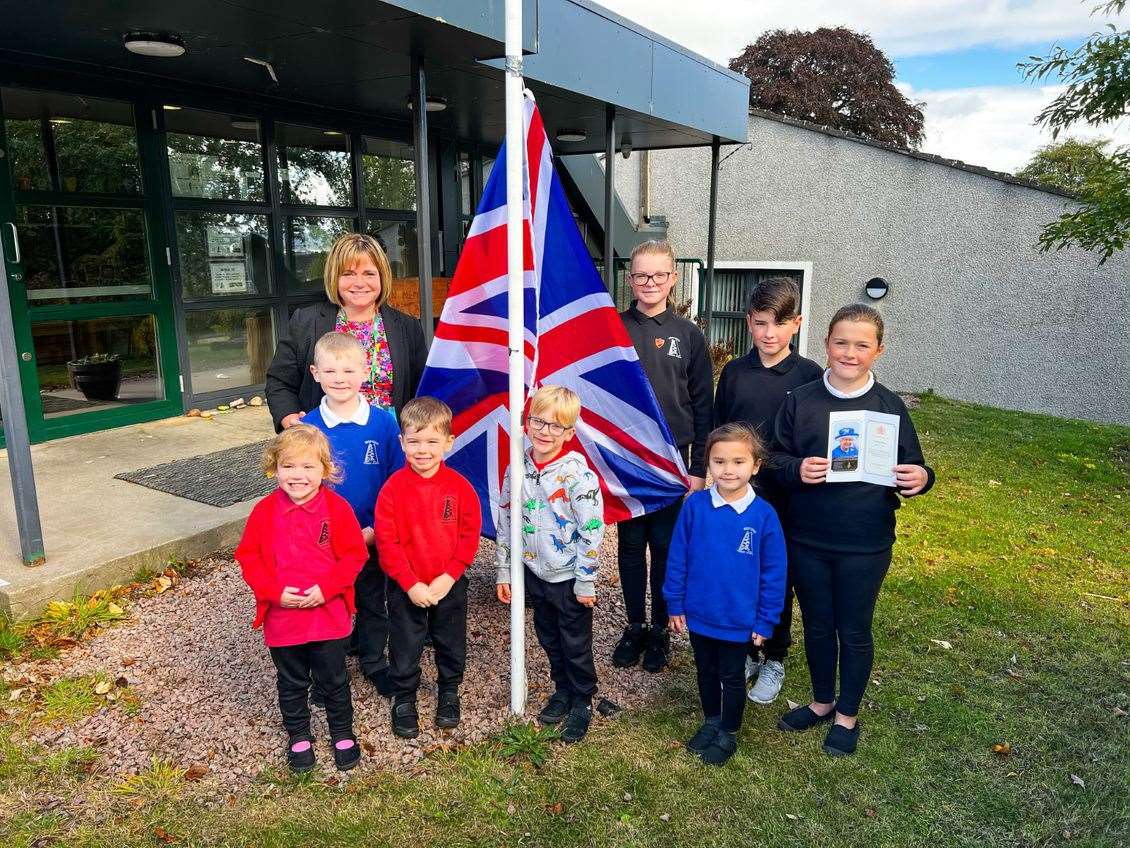 Muirtown Primary and Nursery School Head Teacher Janice MacRae with primary and nursery pupils. Picture: Highland Council