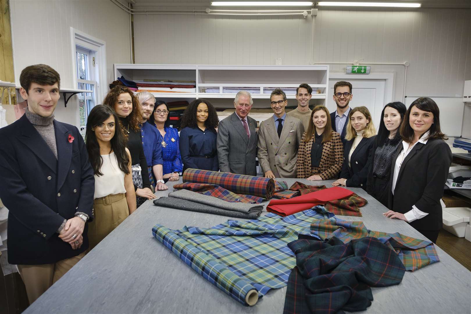 Charles with Modern Artisan students (Mike Wilkinson/PA)