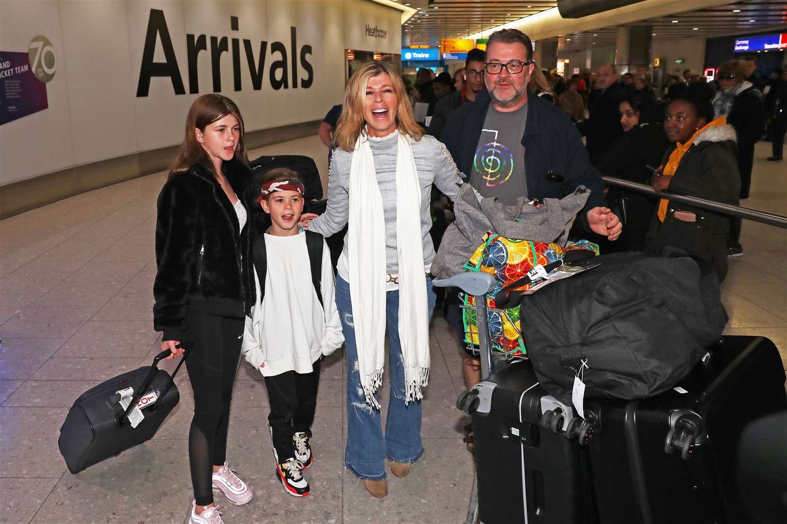 Kate Garraway with Derek Draper and their children in 2019 (Steve Parsons/PA)