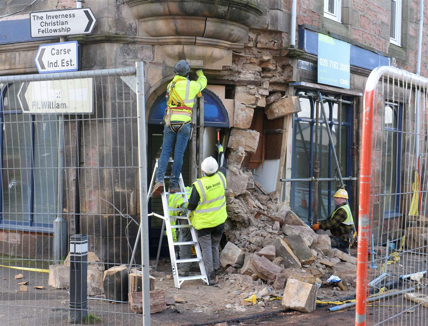 Workmen begin to shore up damaged building following RTC on Grant Street as car hits former William Hill on junction with Lochalsh Road on Thursday night..Picture HN&M staff...