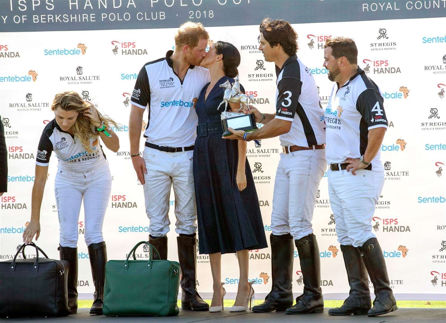 Harry and Meghan at a charity polo match (Steve Parsons/PA)