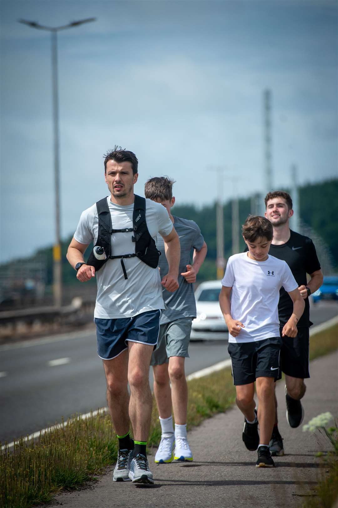 Steven Mackay, 4 marathons in 24 hours for MFR Cash for Kids...Nearly there, on the Kessock Bridge...Picture: Callum Mackay..