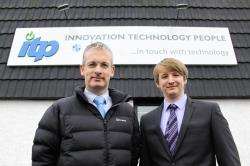 Sandy Macarthur, managing director of ITP Solutions, with graduate Ross Gough.