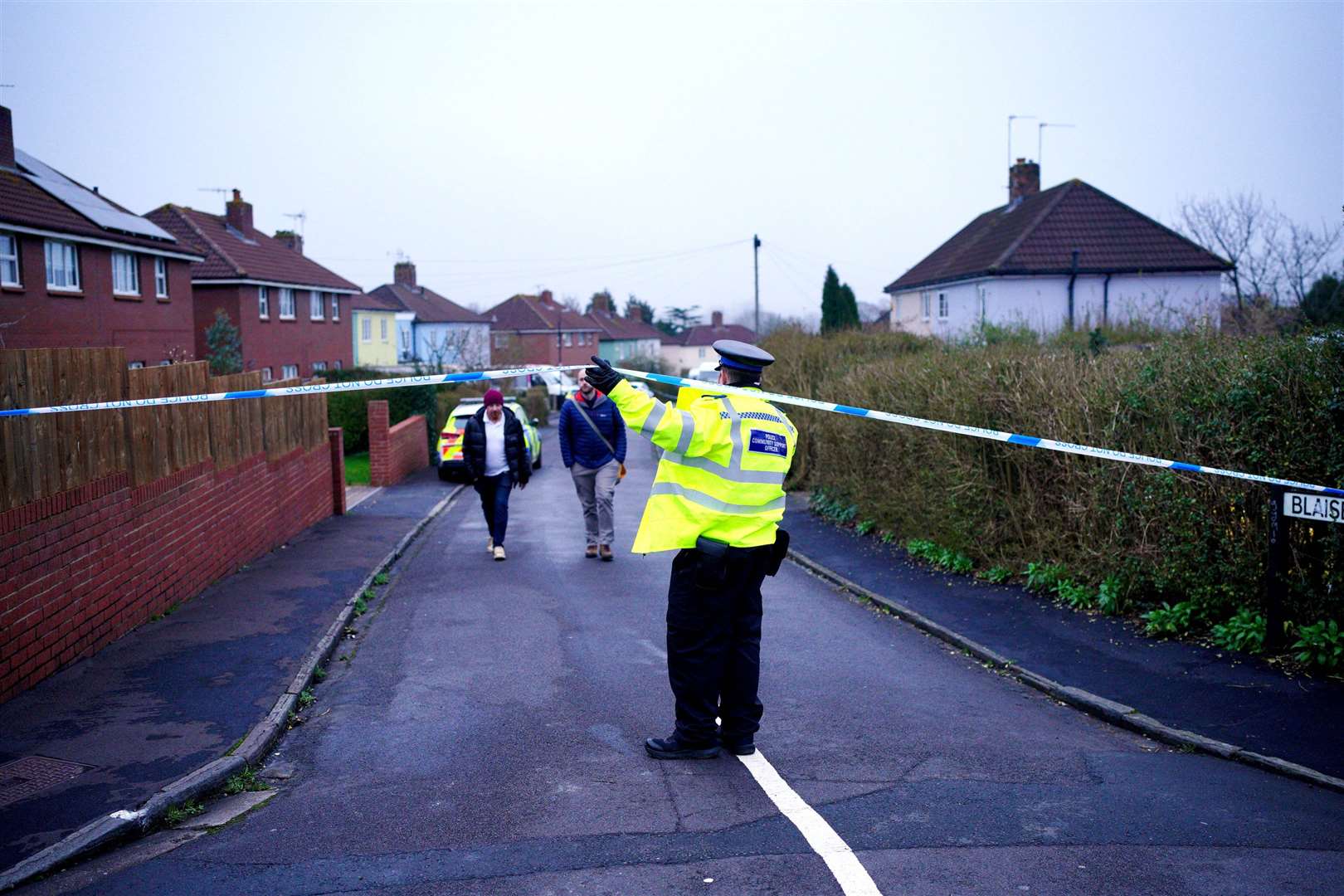 Police at the scene in Blaise Walk (Ben Birchall/PA)