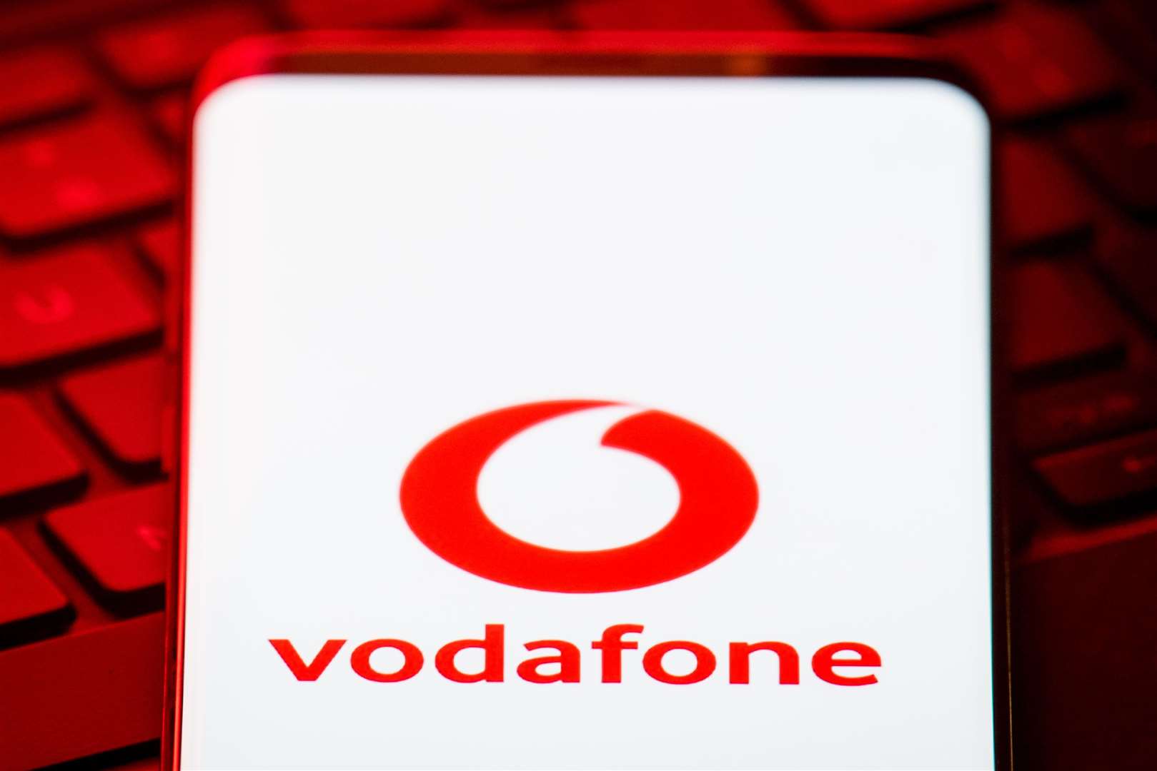 The logo of mobile phone network Vodafone is displayed (Dominic Lipinski/PA)