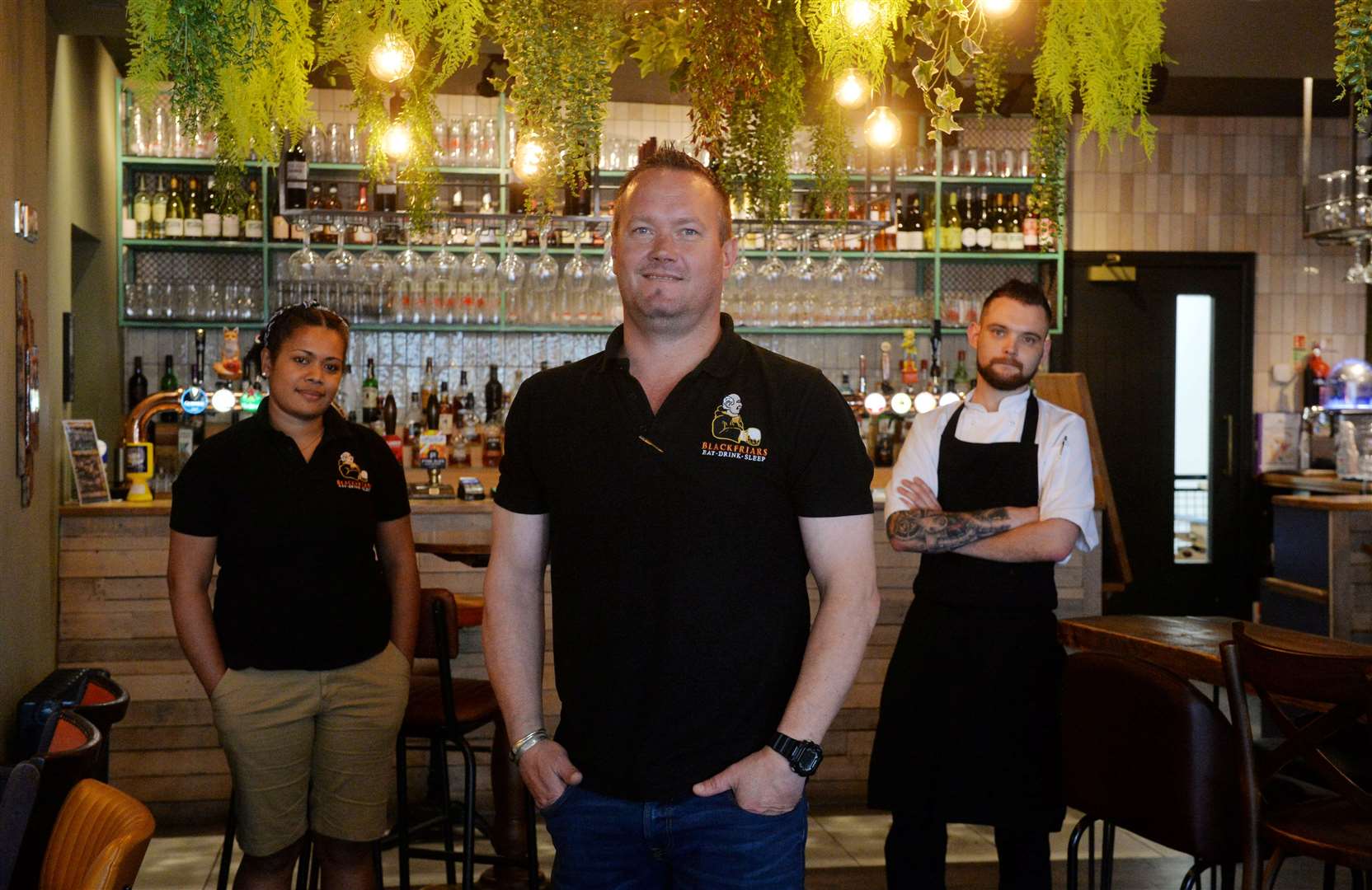 Blackfriars Bar licensee Billy McKechnie with staff members Ruci Taletawa and Ross Guidi.