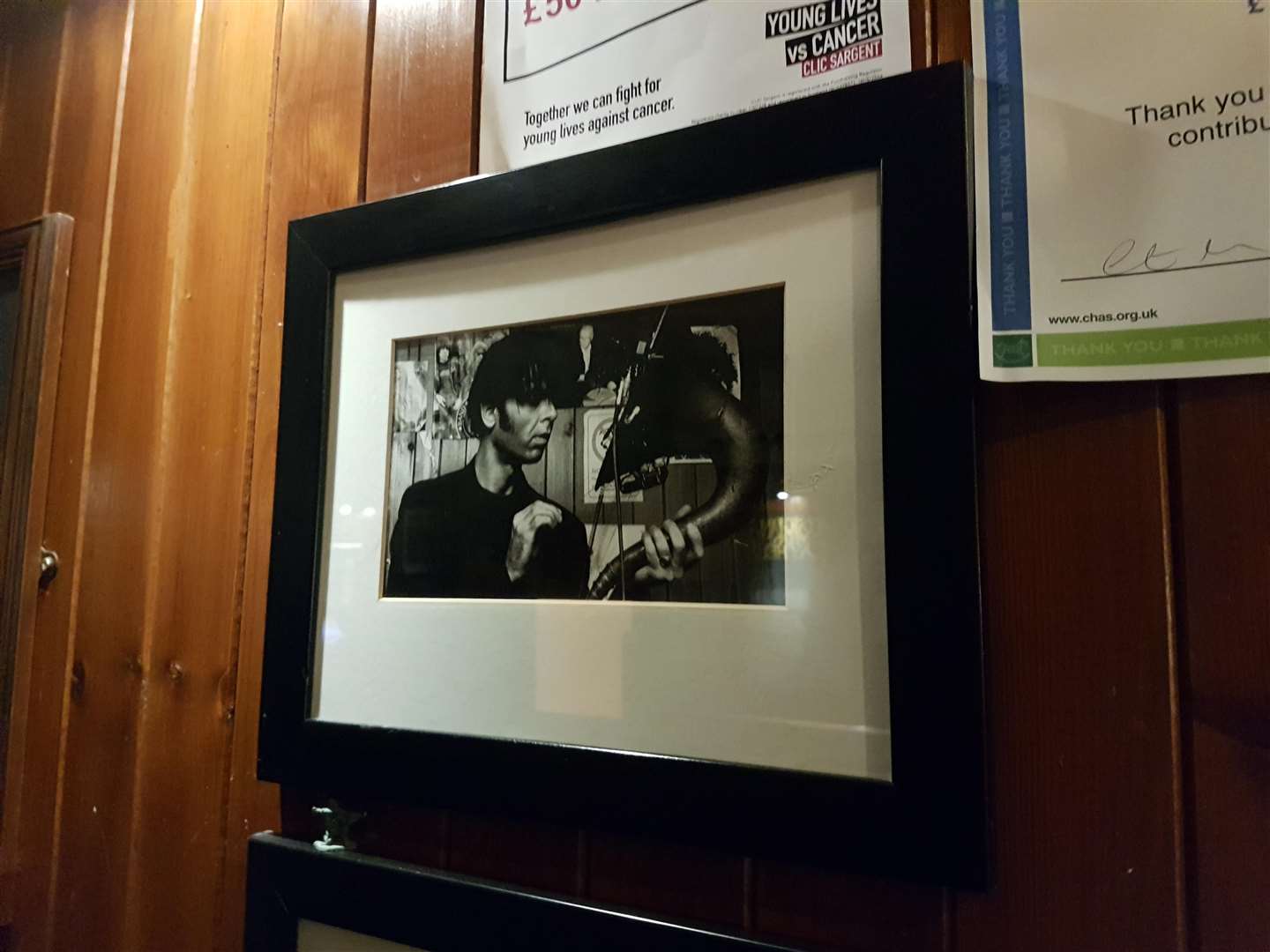 The photograph of Thomas Truax that hangs on the wall of the Market Bar.
