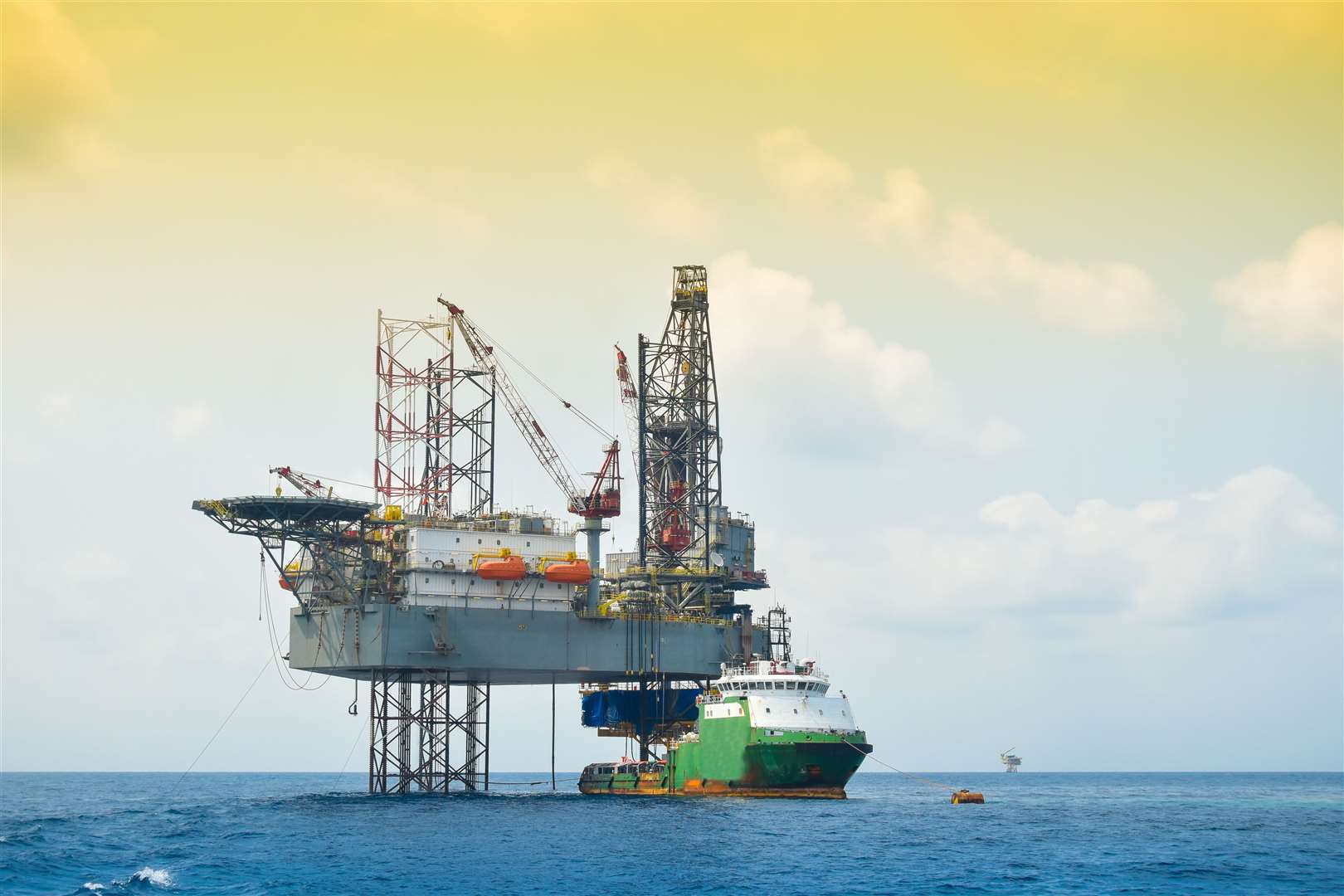 Oil and rig platform operation in north sea, Heavy industry in oil and gas business in offshore, rig operation.