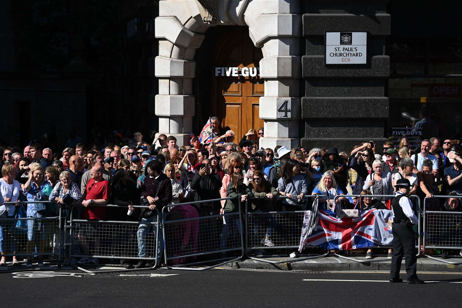 Wellwishers wait for the arrival of the royal family ahead of the National Service of Thanksgiving at St Paul’s (Daniel Leal/PA)