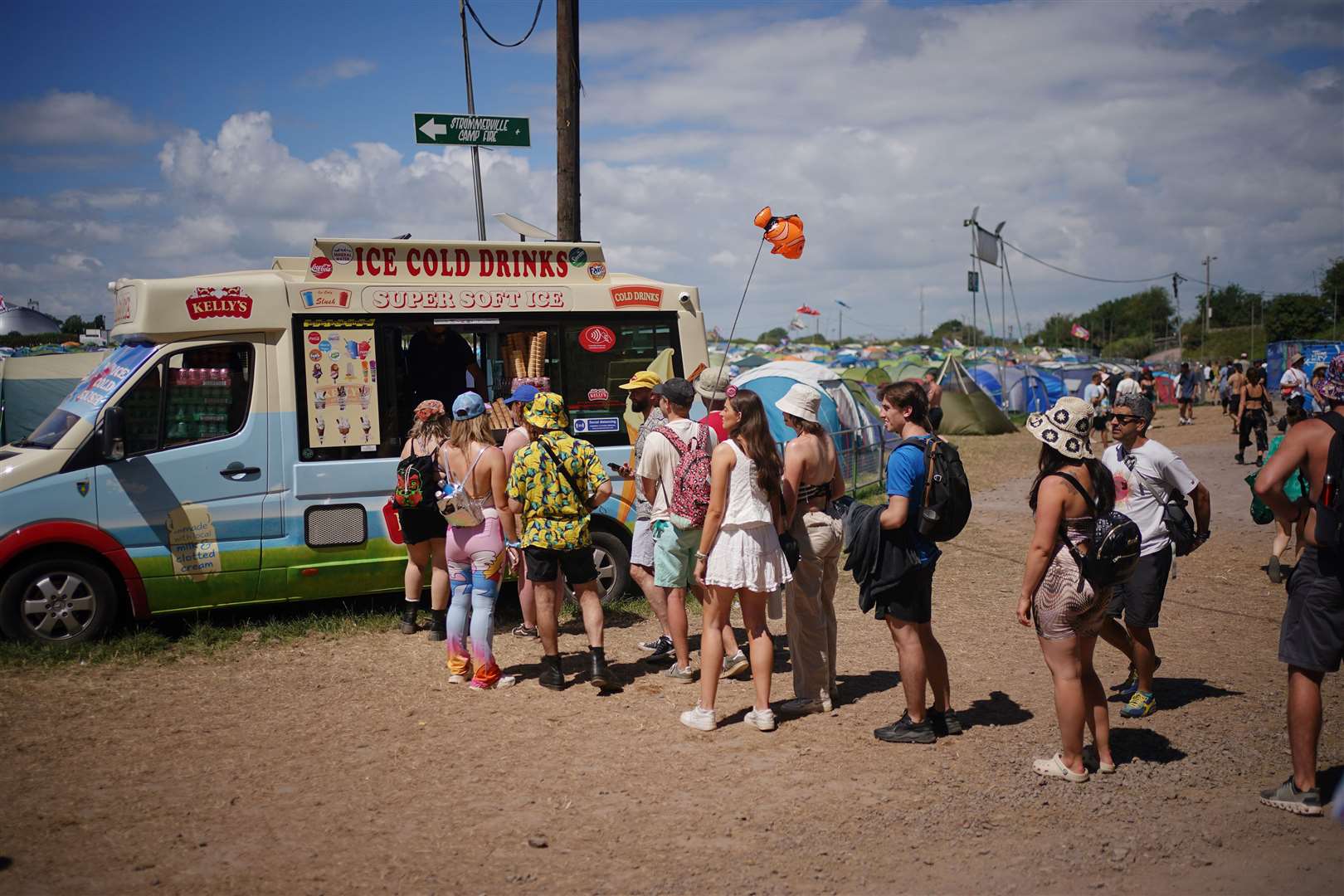 The queues for cold drinks and ice cream stretched out as the Somerset festival site grew warmer (Yui Mok/PA)