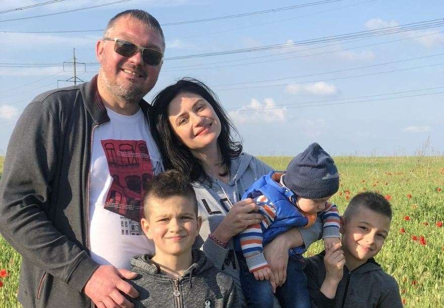 Yulia and her family in Ukraine in happy times.