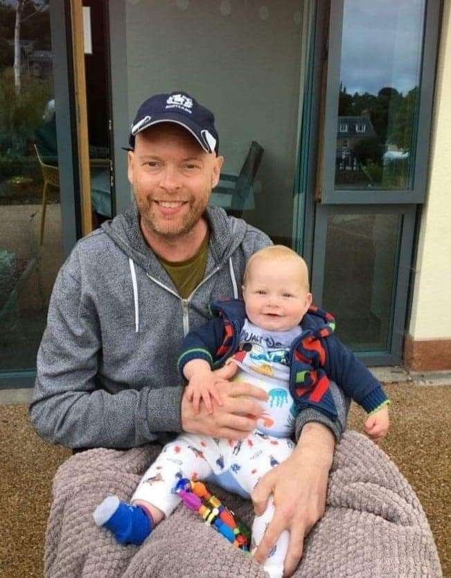 Pete Nairne with his baby son Archie.