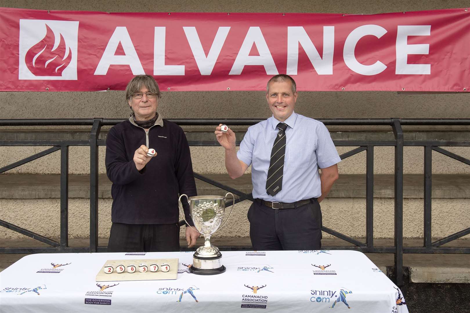 Former president Jim Barr and current Camanachd Association president Steven MacKenzie conducted the draw. Picture: Neil Paterson