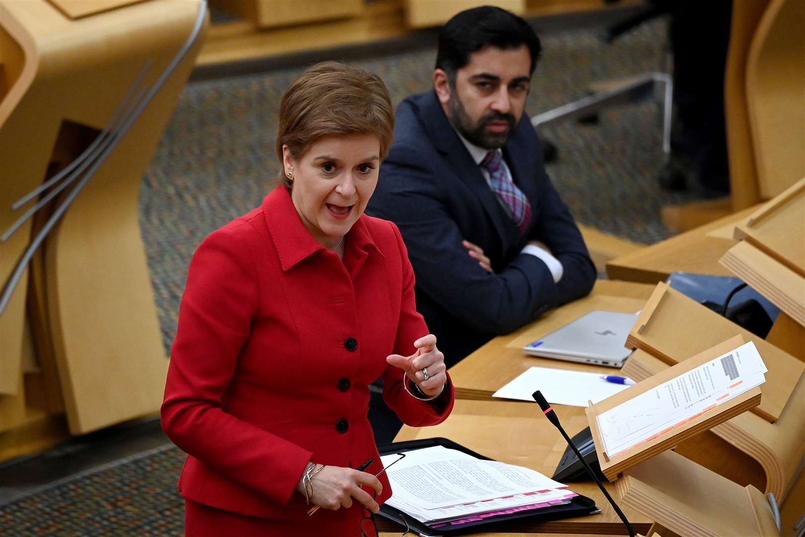 Outgoing First Minister Nicola Sturgeon faced questions on the performance of Health Secretary Humza Yousaf (Jeff J Mitchell/PA)