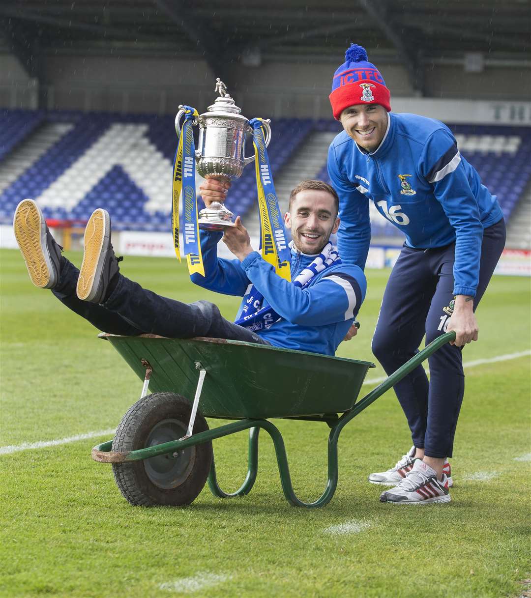 Nick Ross being wheeled around the Caledonian Stadium by Greg Tansey – and this was before Caley Thistle even got to the final... Picture: Ken Macpherson