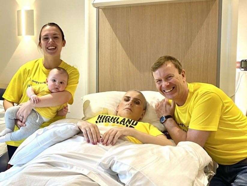Shireen and Zach at her mum Joan's bedside at the hospice, with Joan's husband Jack.