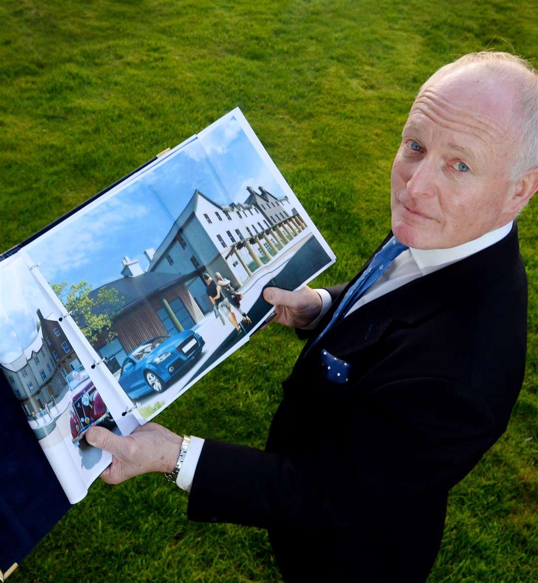 William Frame is facing court action over the name of his proposed new hotel and retail development.