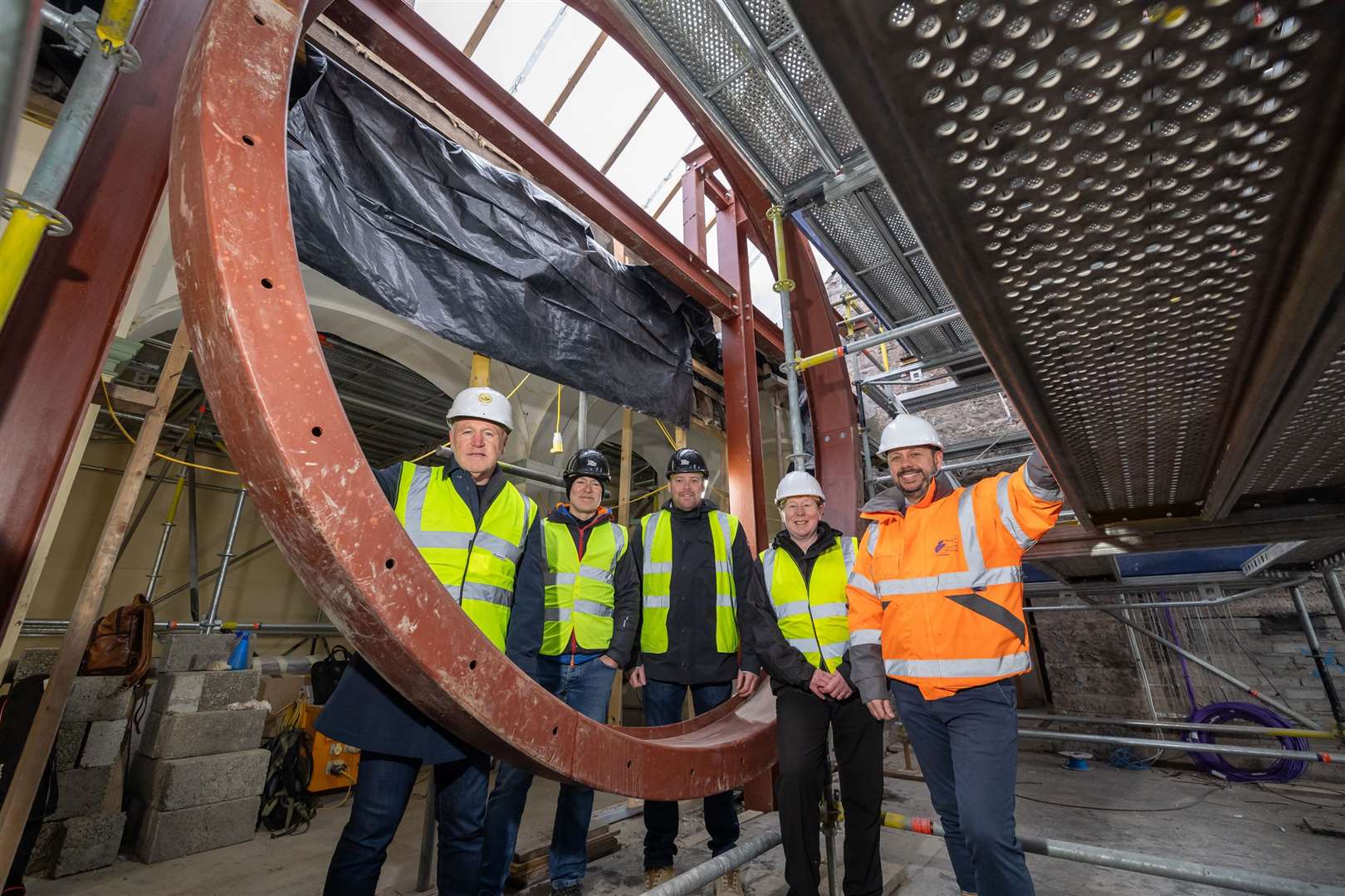In the Rose Window room: Chris Mather, Mather & Co; Jim Ibbetson, and Joe Fisher from Workhaus Projects, Fiona Hampton, HLH; Jason Kelman, Highland Council. Credit: HLH/Paul Campbell Photography