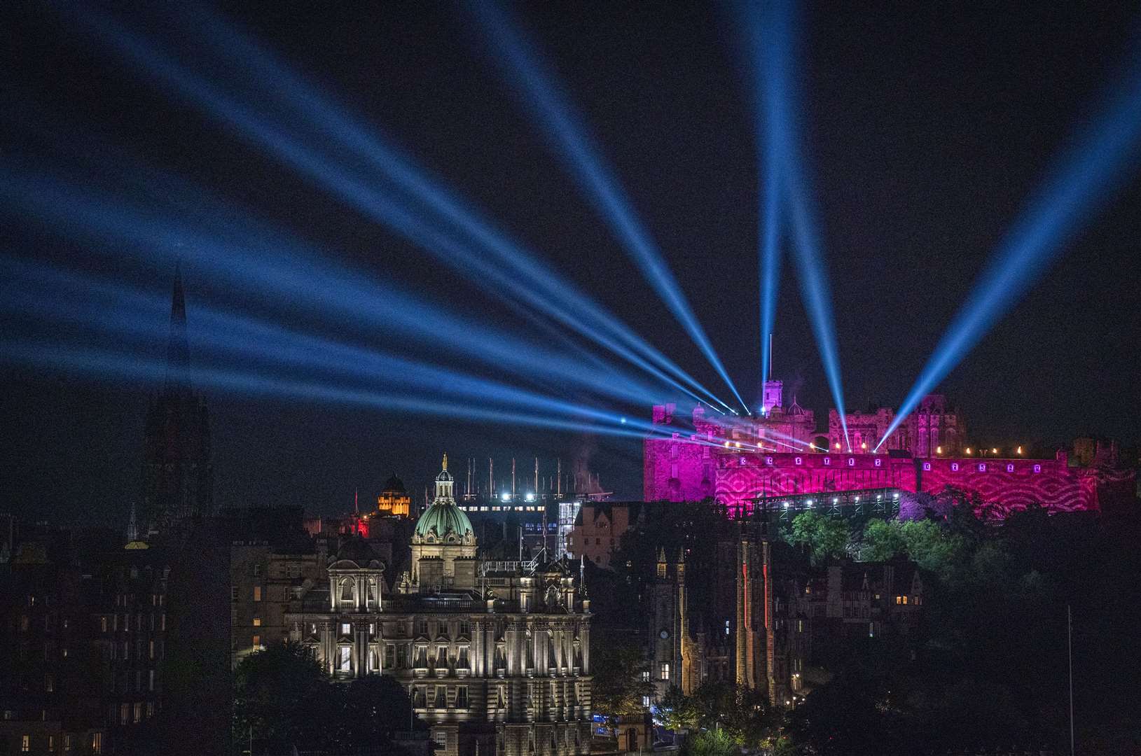 Laser beams and projections lit up Edinburgh Castle during the last night of the Royal Edinburgh Military Tattoo in August (Jane Barlow/PA)