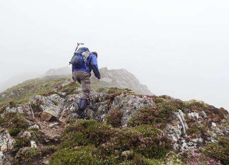 John making his way up into the mist on the south-east ridge of Tom a’ Choinich.