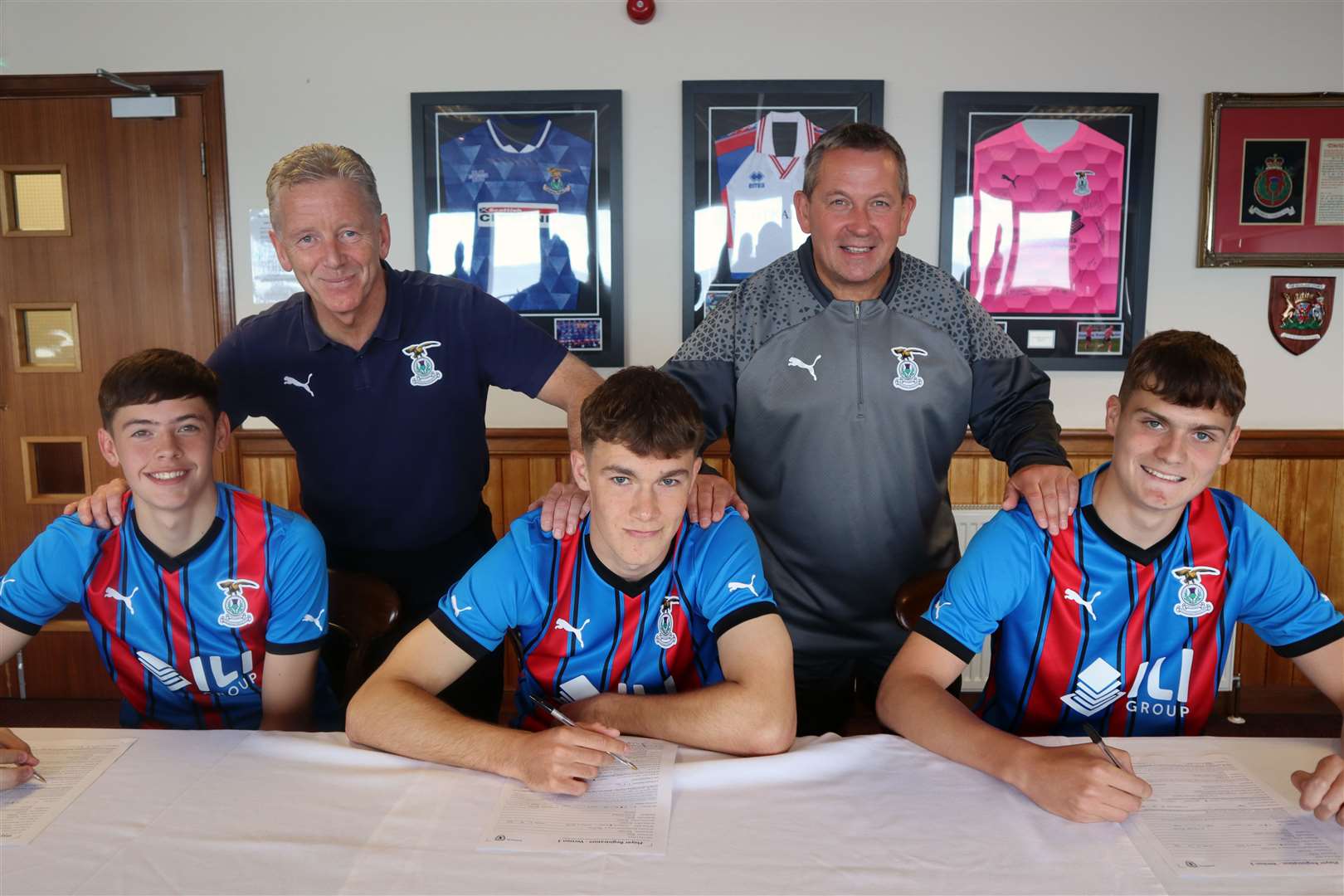 Head of youth development Charlie Christie and manager Billy Dodds with Calum Macleod, Sam Nixon and Jack Walker.